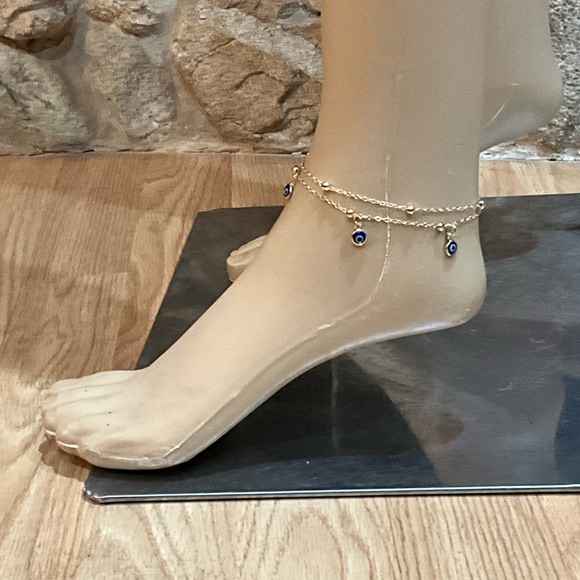 Elegant gold anklet with blue evil eye charms - Picture 2 of 5